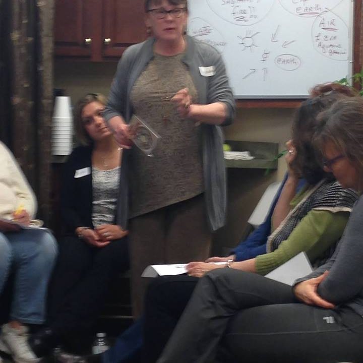 Cassandra Butler teaching an astrology class